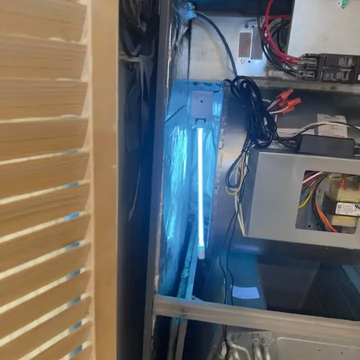 Installed UV germicidal light inside HVAC equipment